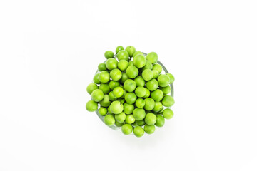 fresh green turkey berry isolated on white background. pea eggplant or solanum torvum in glass bowl. top view.