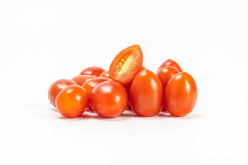 red cherry tomato stack isolated on white background.  small tomato support healthy vision and help protect against cancer.