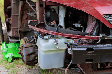 Car getting front passenger side fender replaced due to body damage during car accident