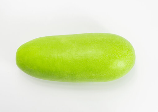 green fresh winter melon or white gourd isolated on white background.
