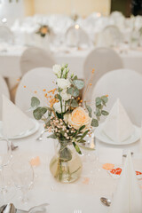 wedding table setting. Beautiful little flowers as table decorations for weddings in Germany. Subtle flowers for weddings	