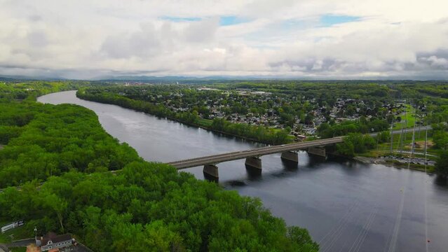 A drone shot of Chicopee Massachusetts with a bridge