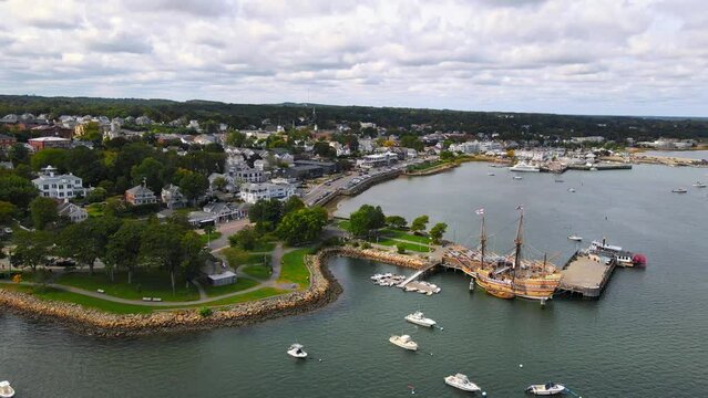 Mayflower harbored on the coastline of a Massachusetts harbor
