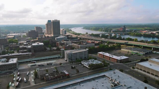 Beautiful drone shot of Springfield, Massachusetts in new England on a sunny morning with the beautiful river running in the back