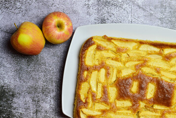 Homemade apple pie, white rectangular plate.