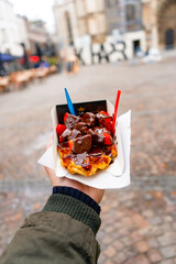 Belgian Waffles with Chocolate and Strawberries  at La gaufrerie near Grote markt in Antwerp during winter : Antwerp , Belgium : November 29 , 2019