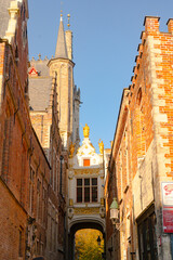 Blinde Ezelstraat , beautiful street , bridge and passage in old town of Brugge during winter sunny day