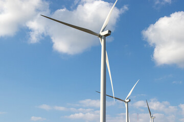 Wind turbine generate electricity with blue sky at Khao Kho Thailand..