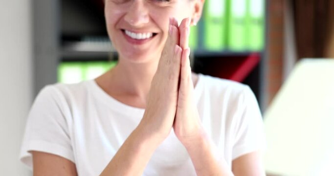 Smiling successful woman rubbing her hands closeup 4k movie slow motion 