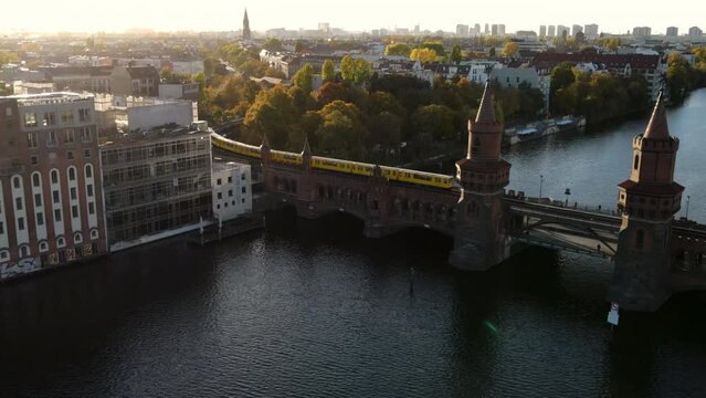 Aerial view on Berlin Germany and the famous Oberbaum bridge during sunset 