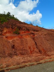 Seychelles, red earth along the road