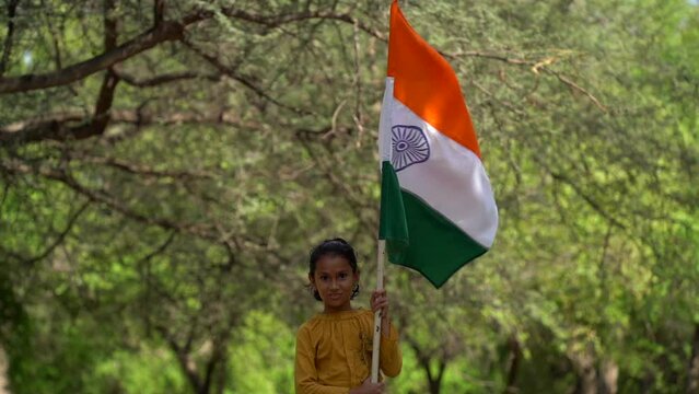 Indian girl with tricolour or indian flag colours. Suitable for Happy Independence day or Republic day greeting.