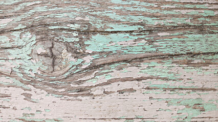 Vintage wood texture with cracked multi-colored pastel paint. Top view