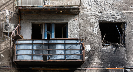 destroyed and burned houses in the city during the war in Ukraine