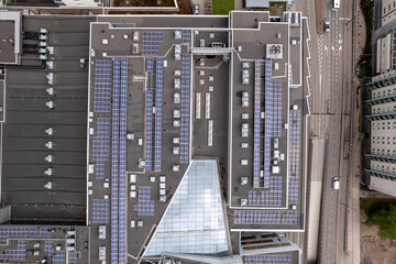 Solar panels on the roof of a shopping mall building