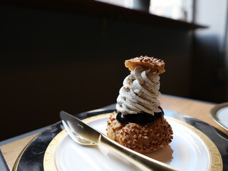 Cream puff on a plate