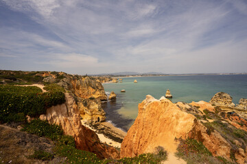 Coastal landscape with sea, rocks, beaches and horizon
