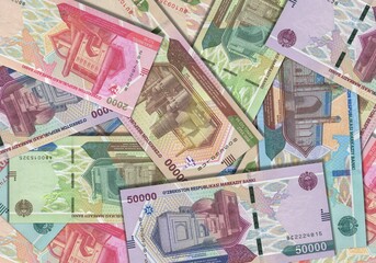 Paper money from Uzbekistan. Uzbekistani soum. Close up banknotes from Uzbekistan