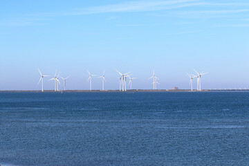 Wind power: wind turbines on the storm surge barrier in the Eastern Scheldt estuary, Netherlands