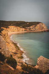 Coastal landscape with sea, rocks, beaches and horizon
