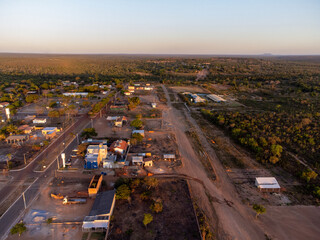 beautiful small country town with reddish sun