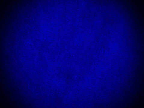 Blue velvet fabric texture used as background. Empty blue fabric background of soft and smooth textile material. There is space for text..