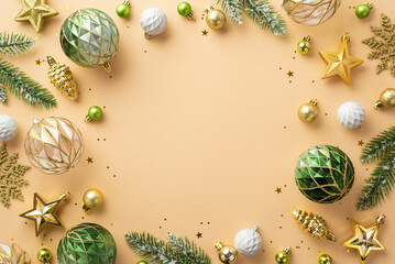 Christmas Eve concept. Top view photo of white transparent gold and green baubles snowflake pine...