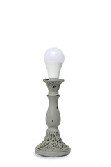 LED economical light bulb in candlestick on white background.