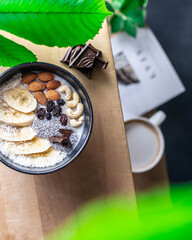 breakfast chia seeds banana nuts almonds cashews raisins coffee journal breakfast
