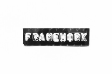 Embossed letter with word framework in black banner on white paper background