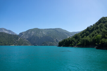 View of the lake and mountain cliffs in the area of the Oimapinar dam. Landscape of Green canyon, Manavgat, Antalya, Turkey