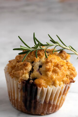 Blueberry Crumble Muffins on the marble floor