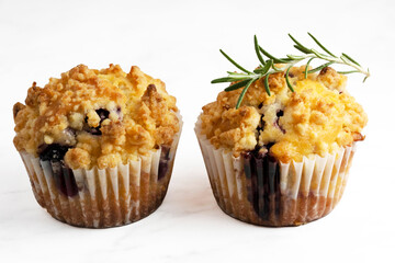 Blueberry Crumble Muffins on the marble floor