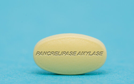 Pancrelipase Amylase Pharmaceutical medicine pills  tablet  Copy space. Medical concepts.