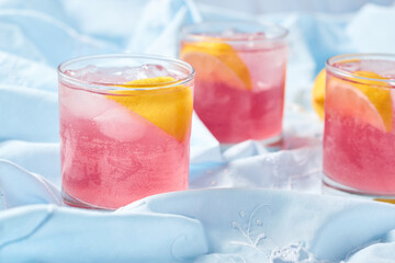 Negroni Cocktail in crystal glass with ice cubes