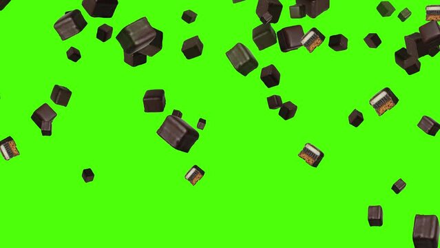  Isolated chocolates fall down in front of green screen. Chocolate dominoes for Christmas background. 25 fps