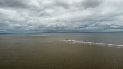 Aerial view of  storm clouds  over the sea. Taken on the Suffolk coast in England. 