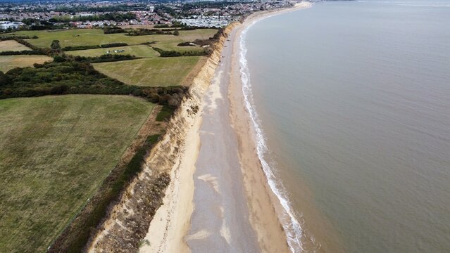 Aerial View Of Lowestoft Coast Line With Views Of The Beach And Waves Crashing. Suffolk Coastal Town. 
