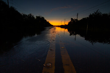 Flooded road from hurricane Ian early morning