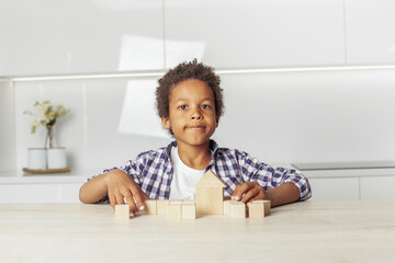 Fototapeta premium Portrait of happy preschool curly child little boy