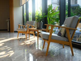 Interior of a modern hotel lounge cafe bar restaurant with beautiful sunlight.