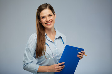 Happy smiling doctor woman in blue medical uniform. Isolated portrait of female medical worker