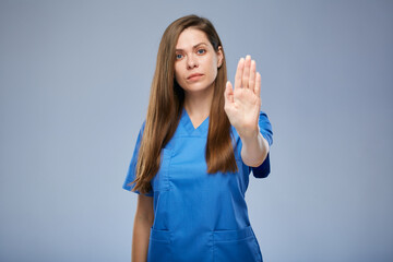 Entering without protective medical equipment is forbidden. Woman stop symbol with hand.
