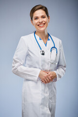 Smiling doctor woman in white coat. Isolated portrait.