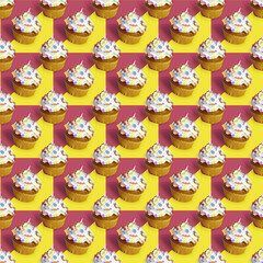 Cupcake pattern with colored sprinkles. Cupcakes with white cream and sugar sprinkles.