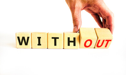 Without or with symbol. Concept words Without and With on wooden cubes. Beautiful white table white background. Businessman hand. Business without or with concept. Copy space.