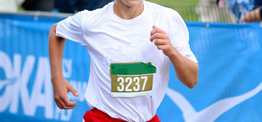 Runner finishing a cross country race