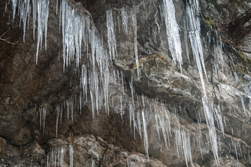Photo of big icicles on mountain during winter