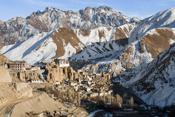 Lamayuru Gompa, Ladakh, India, monastery overlooking the village and snowy mountains in the background