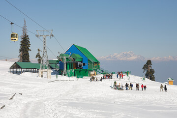 GULMARG SKI RESORT, KASHMIR, INDIA: Indian tourists skiing in Kongdoori, first station of the...